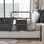 Black bed assist rail installed on a sofa bed, with front storage pocket panel.