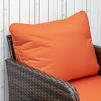 Orange cushion with thick padding on dark brown PE rattan armchair backrest