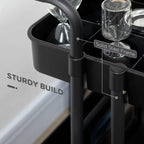 Black trolley frame with sturdy upright bars and side storage bin