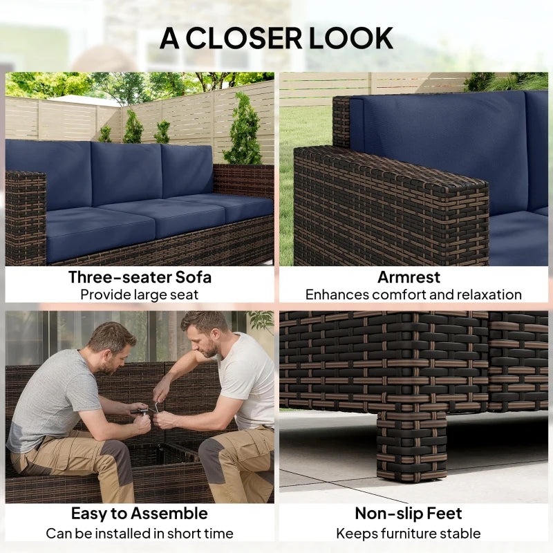 3-seater rattan sofa with dark blue cushions, woven armrests, and sturdy frame