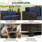 3-seater rattan sofa with dark blue cushions, woven armrests, and sturdy frame