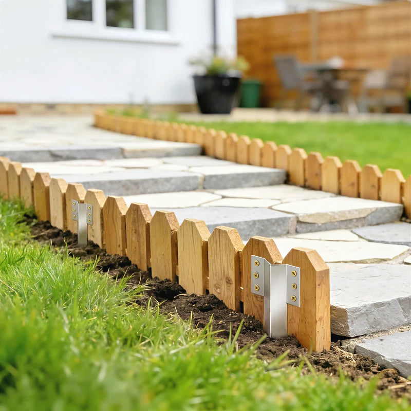 Wood edging held by silver steel stake brackets along a stone pathway