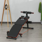 Black sit-up bench with thigh pads, red resistance rope, and arm handles