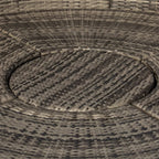 Woven rattan round daybed top with dark grey cushions and braided edge