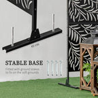 Black metal privacy screen with stable base and ground stakes for outdoor use