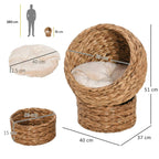 Rattan wicker cat bed with cushion, cylindrical base and domed round opening; size shown