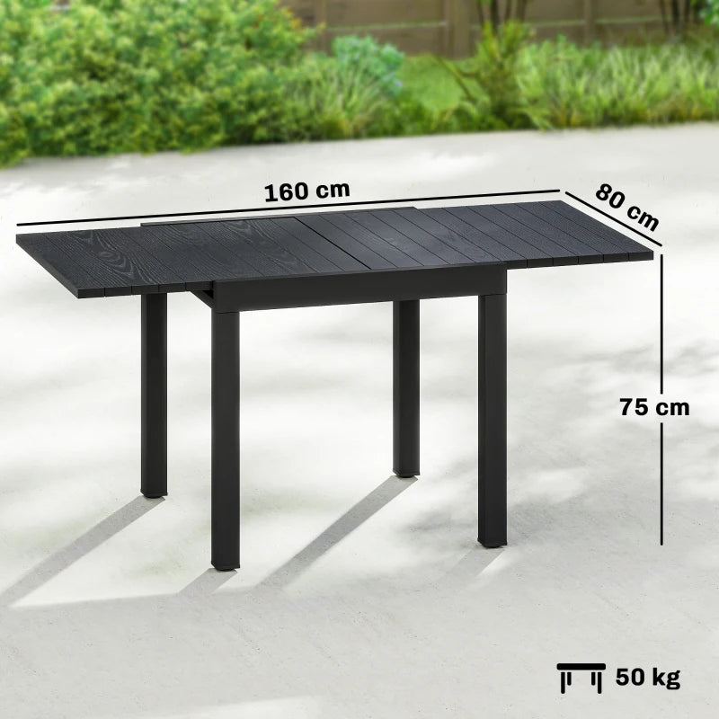 Black extending outdoor dining table with slatted top; dimensions marked on the tabletop