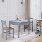 Two grey dining chairs with slat back and pine wood seats in dining area