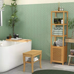 Natural wood slatted shower bench stool with tabletop and lower shelf beside bathtub.