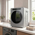 Silver compact tumble dryer on counter next to a washer, round door visible