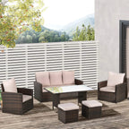 Mixed brown rattan patio seating set with glass-top table, cushions, and ottomans