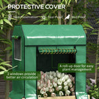 Green greenhouse cover raised planter box with front roll-up door and side windows