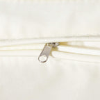 Cream cushion cover zipper track close-up