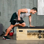 Black adjustable dumbbells in use, showing end plates and rod-mounted handles