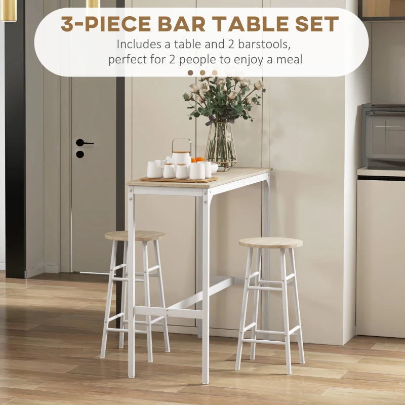 3-piece bar table set with two light oak-tone stools against a white cabinet backdrop.