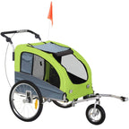 Green three-wheel dog bike trailer with grey mesh windows and zippered door
