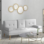 Gold-tone metal wall mirror set with five circular ring frames above a white sofa