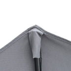 Dark grey half market umbrella canopy edge with stitching and inner support ribs.