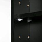 Black cabinet door hardware with concealed shelf tabs and white handle accents