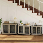 Set of gray indoor dog crate end tables with metal front doors in a living room setting.