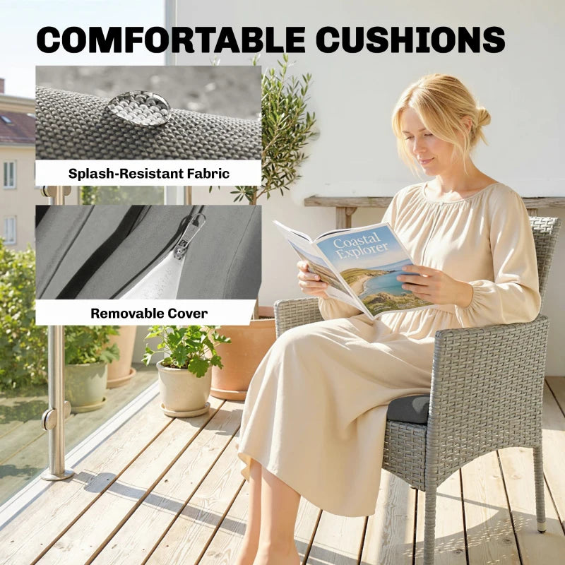 Dark grey rattan bistro armchair with cushioned seat and removable cover