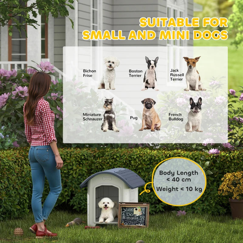 Outdoor dog kennel in white plastic with dark grey roof, open front doorway