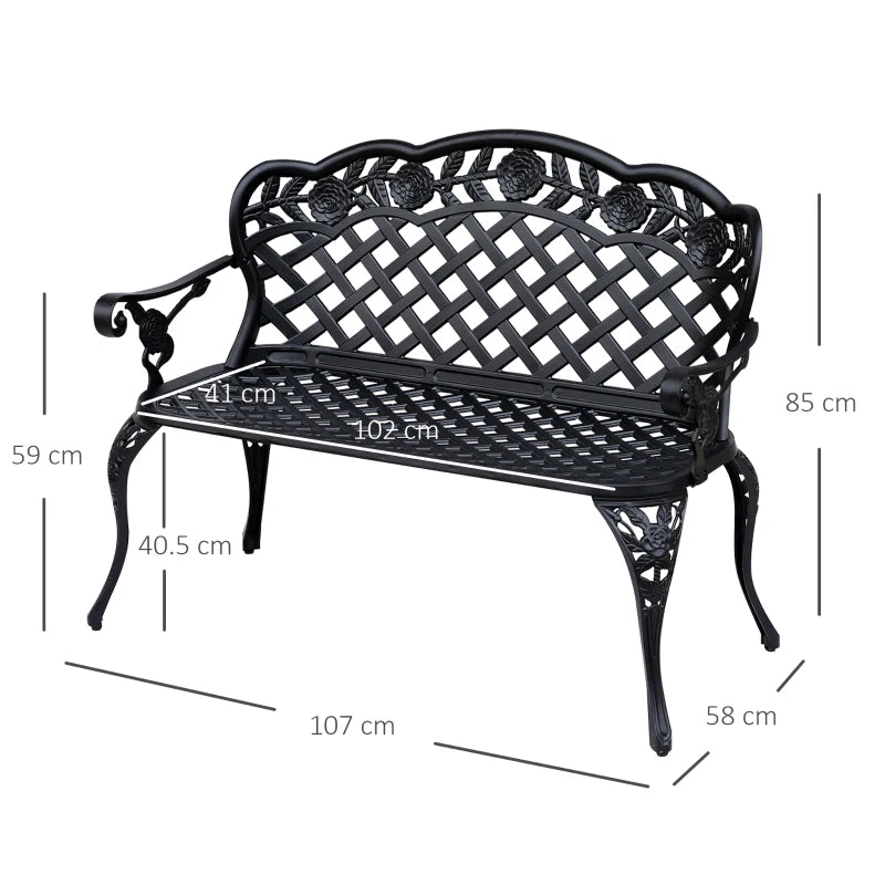 Black cast aluminum garden bench with scrolling arms and lattice back, side view