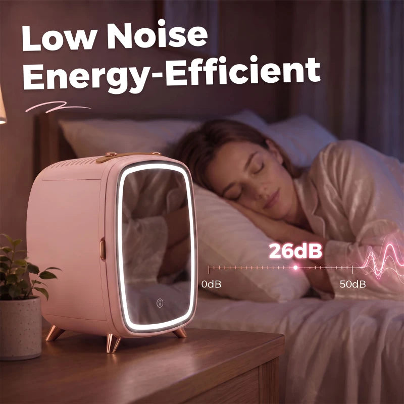 Pink mini skincare refrigerator with glowing LED mirror door on a bedside table
