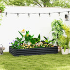 Dark grey galvanised steel planter with mixed plants and colorful flowers