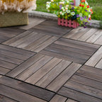 Installed interlocking wood decking tiles with dark plank pattern and straight grout lines