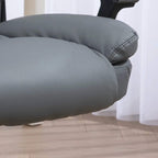 Dark grey padded armrest and seat cushion with stitched upholstery