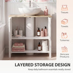 White under-sink cabinet with open shelves for toiletries, towels, and storage items