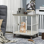 White-bar dog crate end table with gray top and cushion, small dog inside