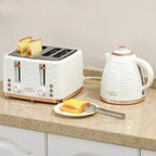 Cream-white electric kettle and 4-slice toaster set with rose-gold accents on counter