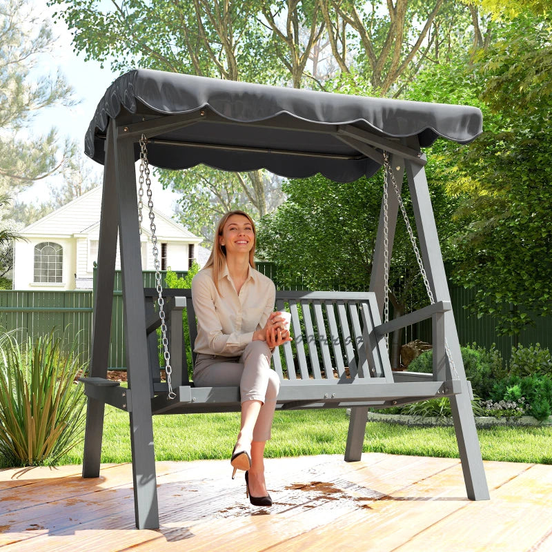 Grey wooden swing bench with canopy and hanging chains, slatted bench seat