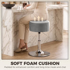 Grey round bar stool with padded seat cushion and chrome height-adjustable base