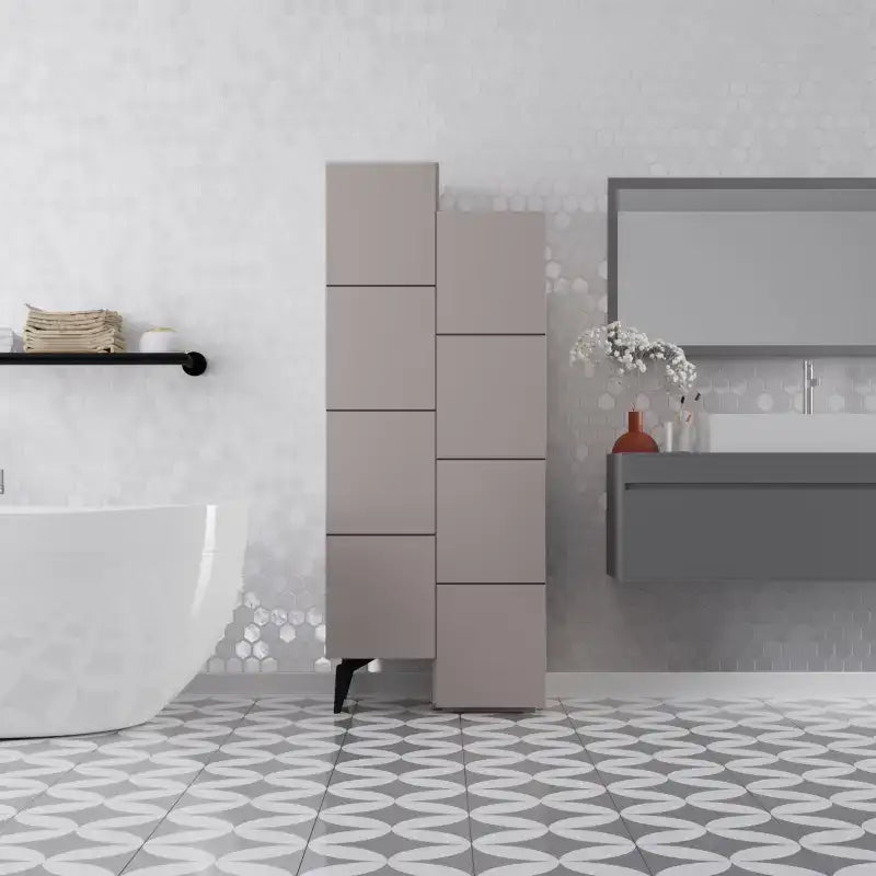 Light mocha multipurpose storage cabinet standing beside a bathroom sink, with tiered doors.