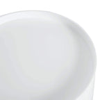 White round tabletop surface of a bedside table