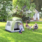 Green pop-up dome camping tent in backyard with open doors for campers