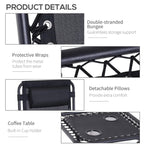 Black patio chair and coffee table detail with built-in cup-holder tabletop
