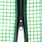 Close-up of green PE cover zipper track on a portable mini greenhouse door