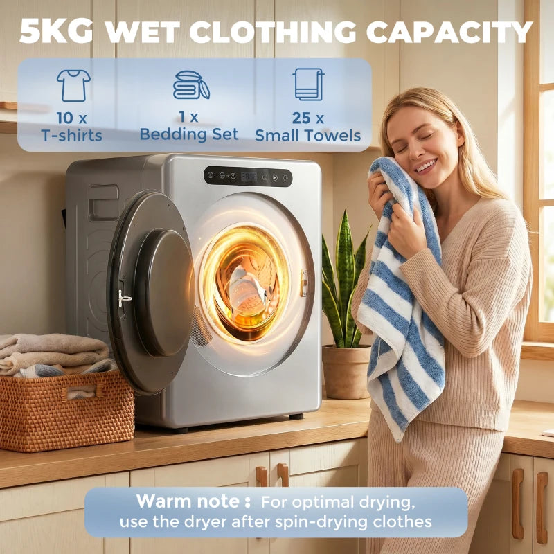 Silver compact tumble dryer with open door and glowing drum light