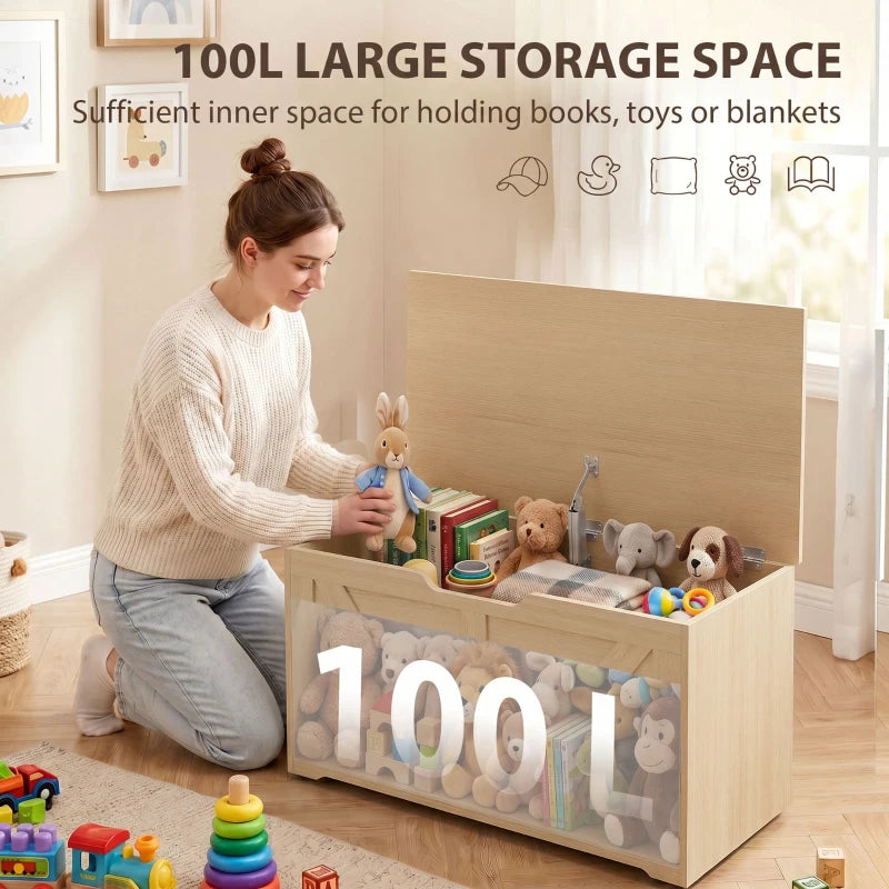 Large wooden storage box with open lid containing stuffed animals and books
