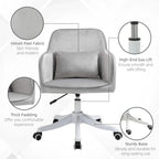 Grey velvet office chair with thick padding, lumbar pillow, and sturdy white base