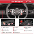 Audi TT RS ride-on car dashboard with steering wheel and labeled control buttons