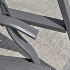 Dark grey swing bench frame joint with curved support bar and bolts