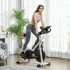 Woman using a stationary exercise bike indoors with black handlebars and pedals