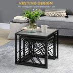 Black metal nesting coffee table with grey tabletop and cross-braced open sides