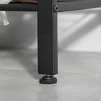 Adjustable foot pad on black metal leg of the coat rack shoe bench
