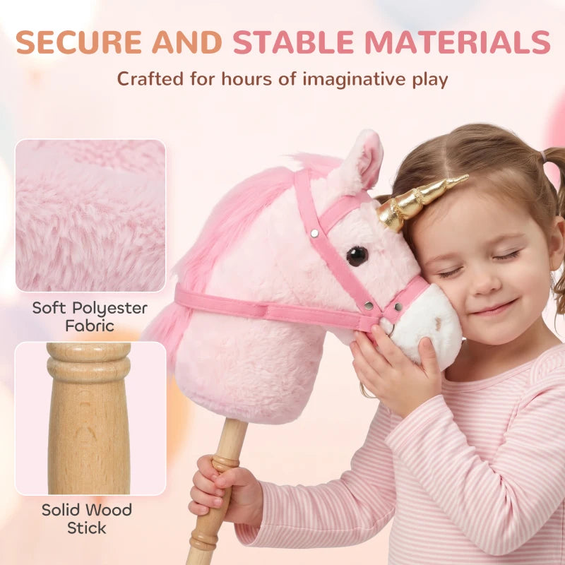 Pink plush unicorn stick horse with grip handle and gold horn, child holding